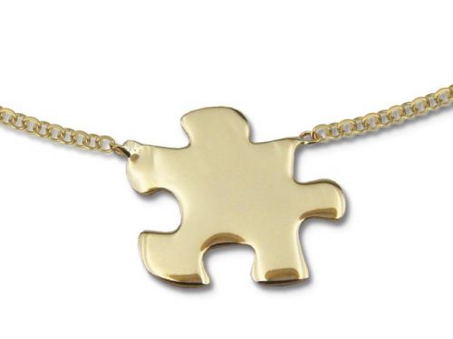 Naszyjnik ze złota - celebrytka z motywem puzzle - model 17